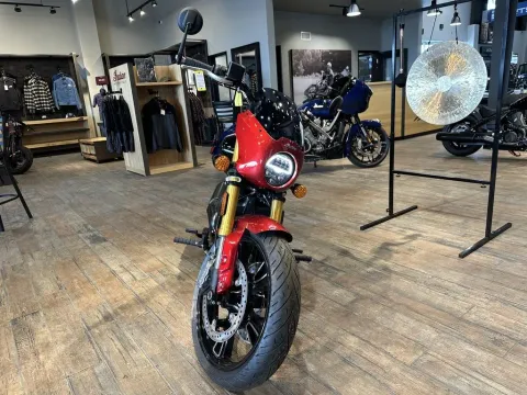 Another view of 2025 Indian Motorcycle 101 Scout® Sunset Red Metallic with Graphics for sale in Pueblo West, CO at Strictly Powersports
