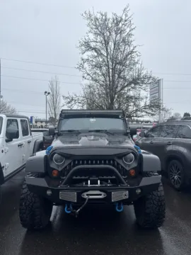 Black 2012 Jeep Wrangler Unlimited Sport for sale in Auburn, WA