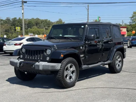 Another view of 2017 JEEP WRANGLER UNLIMI SAHARA for sale in Knoxville, TN at Hilltop Car Sales