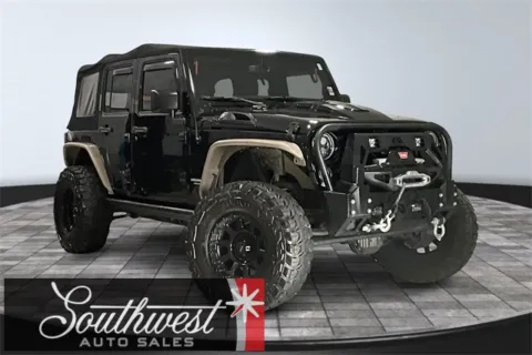 Black 2016 Jeep Wrangler Unlimited Rubicon for sale in Roanoke, IN
