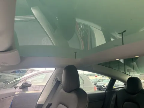 Photos of 2021 Tesla Model 3 Standard Range Plus for sale in Auburn, WA at Auburn Volkswagen