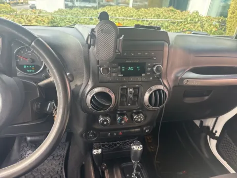 Another view of 2013 Jeep Wrangler Unlimited Sport for sale in Auburn, WA at Bud Clary Auburn Volkswagen