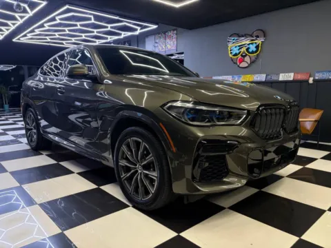 Brown 2023 BMW X6 xDrive40i Sport Utility 4D for sale in North Miami Beach, FL