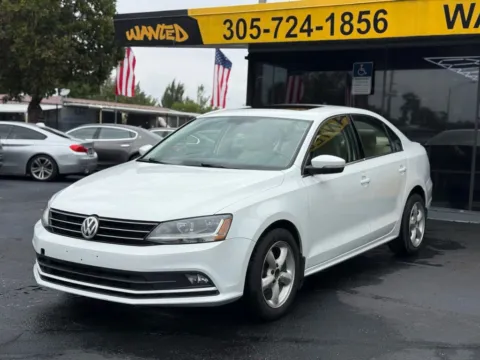 Green 2017 Volkswagen Jetta 1.8T SEL Sedan 4D for sale in North Miami Beach, FL