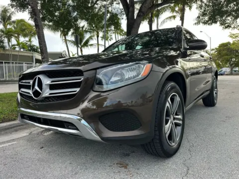 Yellow 2016 Mercedes-Benz GLC 300 Sport Utility 4D for sale in North Miami Beach, FL