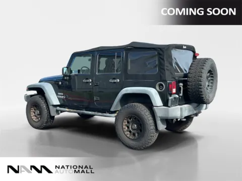 Another view of 2014 Jeep Wrangler Unlimited Sport for sale in Merritt Island, FL at National Auto Mall