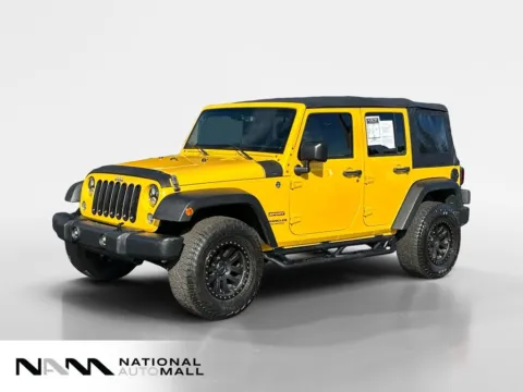Yellow 2015 Jeep Wrangler Unlimited Sport for sale in Merritt Island, FL