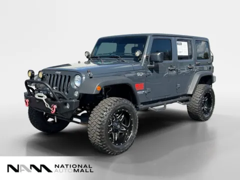 Gray 2017 Jeep Wrangler Unlimited Sport for sale in Merritt Island, FL