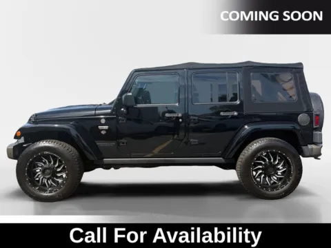 Photos of 2017 Jeep Wrangler Unlimited Sahara for sale in Merritt Island, FL at National Auto Mall