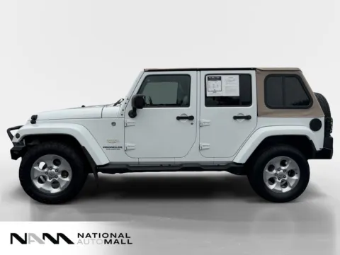 Photos of 2014 Jeep Wrangler Unlimited Sahara for sale in Merritt Island, FL at National Auto Mall