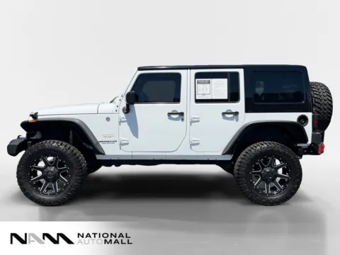 Photos of 2015 Jeep Wrangler Unlimited Sahara for sale in Merritt Island, FL at National Auto Mall