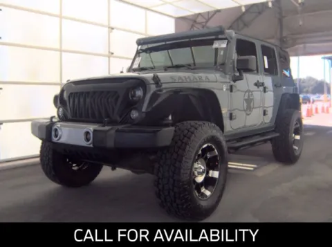 Gray 2014 Jeep Wrangler Unlimited Sahara for sale in Merritt Island, FL