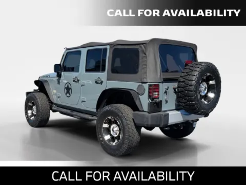 Another view of 2014 Jeep Wrangler Unlimited Sahara for sale in Merritt Island, FL at National Auto Mall