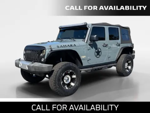 Gray 2014 Jeep Wrangler Unlimited Sahara for sale in Merritt Island, FL