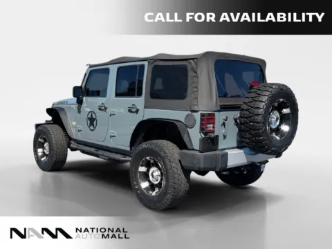 Another view of 2014 Jeep Wrangler Unlimited Sahara for sale in Merritt Island, FL at National Auto Mall