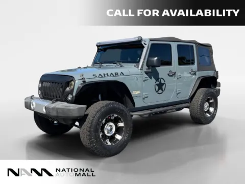 Gray 2014 Jeep Wrangler Unlimited Sahara for sale in Merritt Island, FL