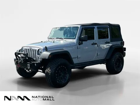Silver 2014 Jeep Wrangler Unlimited Sport for sale in Merritt Island, FL