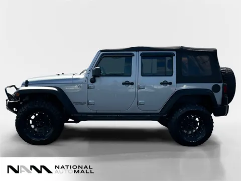 Photos of 2014 Jeep Wrangler Unlimited Sport for sale in Merritt Island, FL at National Auto Mall