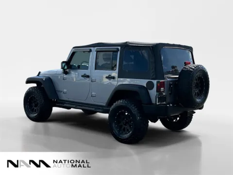 Another view of 2014 Jeep Wrangler Unlimited Sport for sale in Merritt Island, FL at National Auto Mall