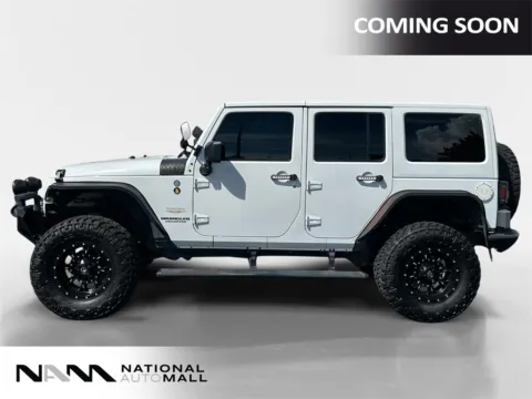 Photos of 2014 Jeep Wrangler Unlimited Sahara for sale in Merritt Island, FL at National Auto Mall