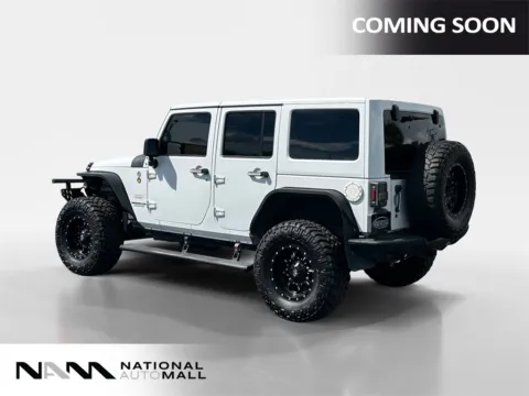 Another view of 2014 Jeep Wrangler Unlimited Sahara for sale in Merritt Island, FL at National Auto Mall