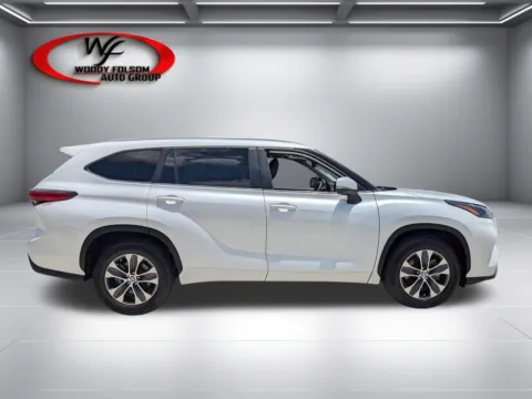 Photos of 2023 Toyota Highlander XLE for sale in Baxley, GA at Woody Folsom Nissan of Baxley