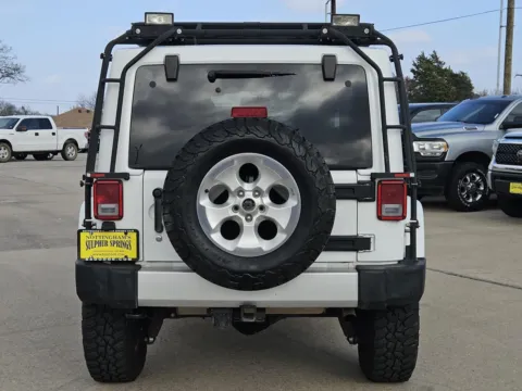 More photos of 2014 Jeep Wrangler Unlimited Sahara at Nottingham Chrysler Dodge Jeep Ram of Sulphur Springs, TX