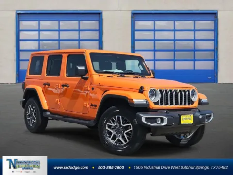 Orange 2025 Jeep Wrangler Sahara for sale in Sulphur Springs, TX