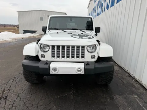 Another view of 2016 Jeep Wrangler Unlimited Sahara for sale in Saint Marys, OH at St. Marys CDJR