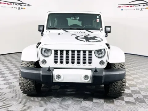 Another view of 2016 Jeep Wrangler Unlimited Sahara for sale in Saint Marys, OH at St. Marys CDJR