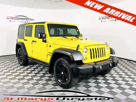Yellow 2015 Jeep Wrangler Unlimited Sport for sale in Saint Marys, OH