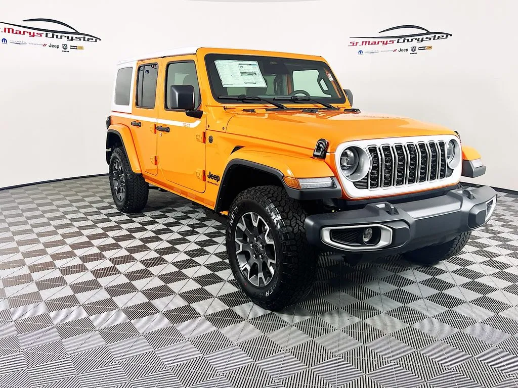 Orange 2026 Jeep Wrangler Sahara for sale in Saint Marys, OH