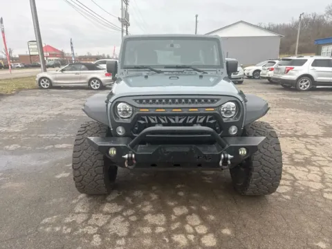 Photos of 2014 Jeep Wrangler Unlimited Sport SUV 4D for sale in Chillicothe, OH at Instant Auto Sales Chillicothe