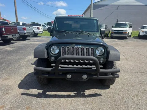 Photos of 2010 Jeep Wrangler Sport SUV 2D for sale in Chillicothe, OH at Instant Auto Sales Chillicothe