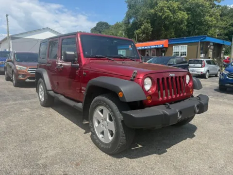 Another view of 2011 Jeep Wrangler Unlimited Sport SUV 4D for sale in Chillicothe, OH at Instant Auto Sales Chillicothe