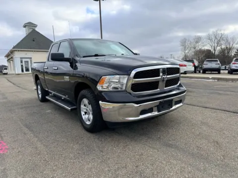 Another view of 2016 Ram 1500 Quad Cab SLT Pickup 4D 6 1/3 ft for sale in Lancaster, OH at Instant Auto Sales Lancaster