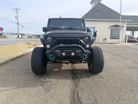 Photos of 2010 Jeep Wrangler Sahara Sport Utility 2D for sale in Lancaster, OH at Instant Auto Sales Lancaster