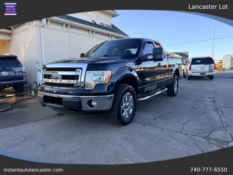 Black 2013 Ford F-150 Super Cab XLT Pickup 4D 6 1/2 ft for sale in Lancaster, OH