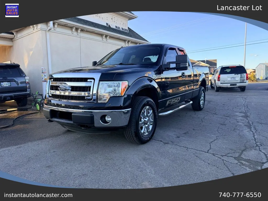 Black 2013 Ford F-150 Super Cab XLT Pickup 4D 6 1/2 ft for sale in Lancaster, OH