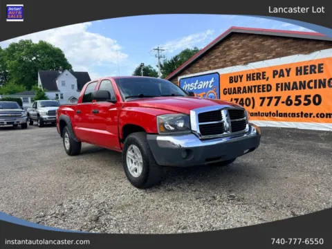 Red 2006 Dodge Dakota Quad Cab SLT Pickup 4D 5 1/2 ft for sale in Lancaster, OH