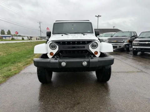 Photos of 2013 Jeep Wrangler Unlimited Sahara Sport Utility 4D for sale in Lancaster, OH at Instant Auto Sales Lancaster