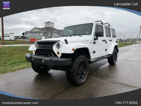 White 2013 Jeep Wrangler Unlimited Sahara Sport Utility 4D for sale in Lancaster, OH