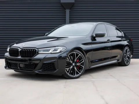 Black 2022 BMW 5 Series M550i xDrive for sale in Austin, TX