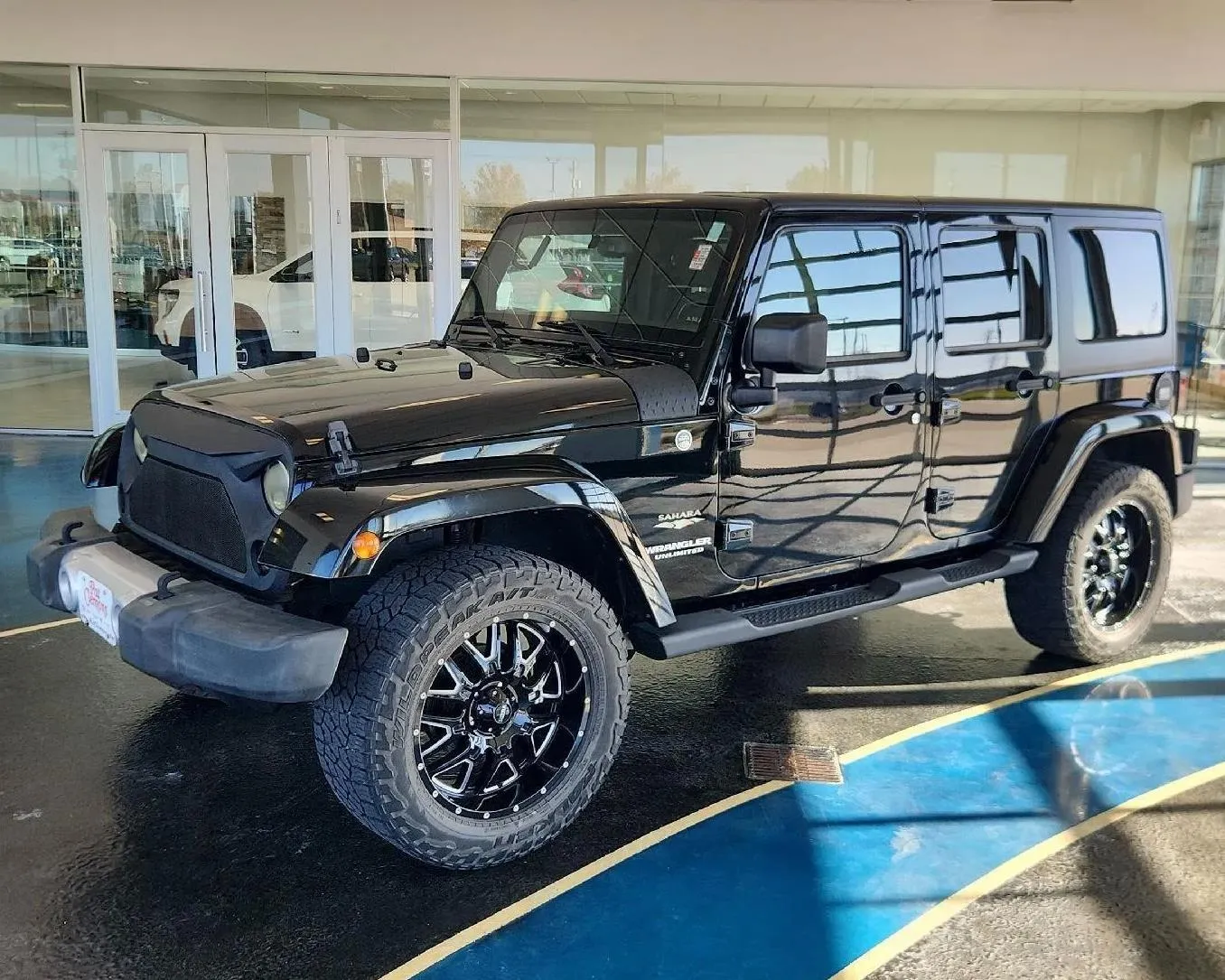 Black 2015 Jeep Wrangler Unlimited Sahara for sale in Boone, IA