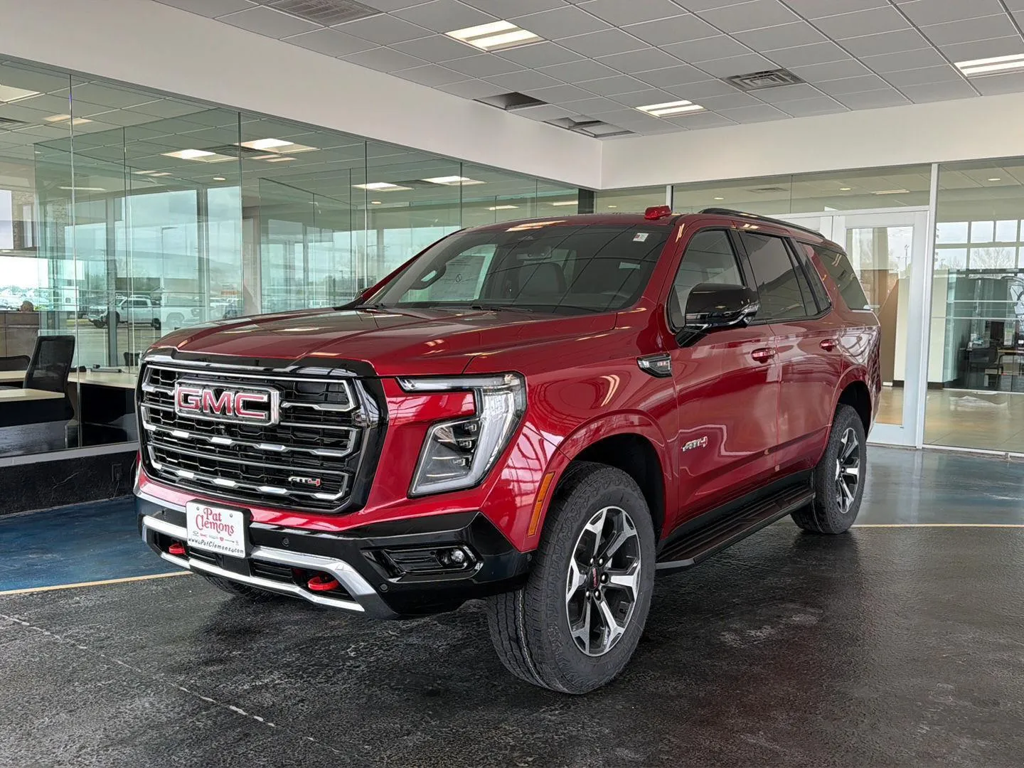 Red 2026 GMC Yukon AT4 for sale in Boone, IA