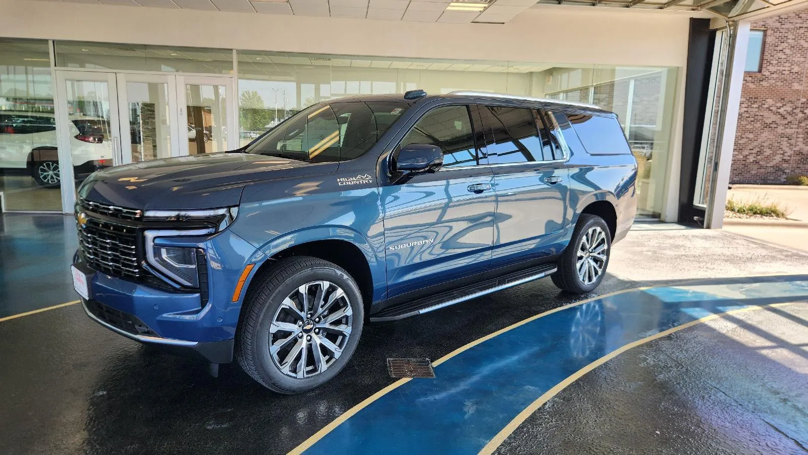 Blue 2026 Chevrolet Suburban High Country for sale in Boone, IA