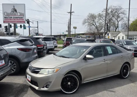 Beige 2014 Toyota Camry LE for sale in Des Moines, IA
