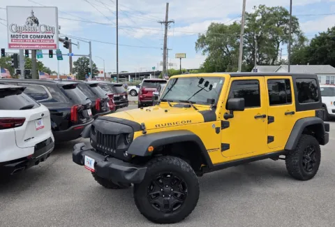 Yellow 2015 Jeep Wrangler Unlimited Rubicon for sale in Des Moines, IA