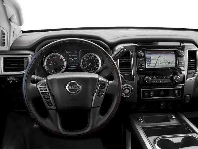 Orange 2016 Nissan Titan XD Platinum Reserve for sale in Des Moines, IA