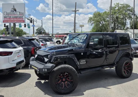 Black 2016 JEEP WRANGLER for sale in Des Moines, IA